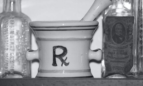 mortar and pestle with Rx label