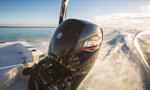 Close-up of a Mercury Marine® outboard motor on the boat.